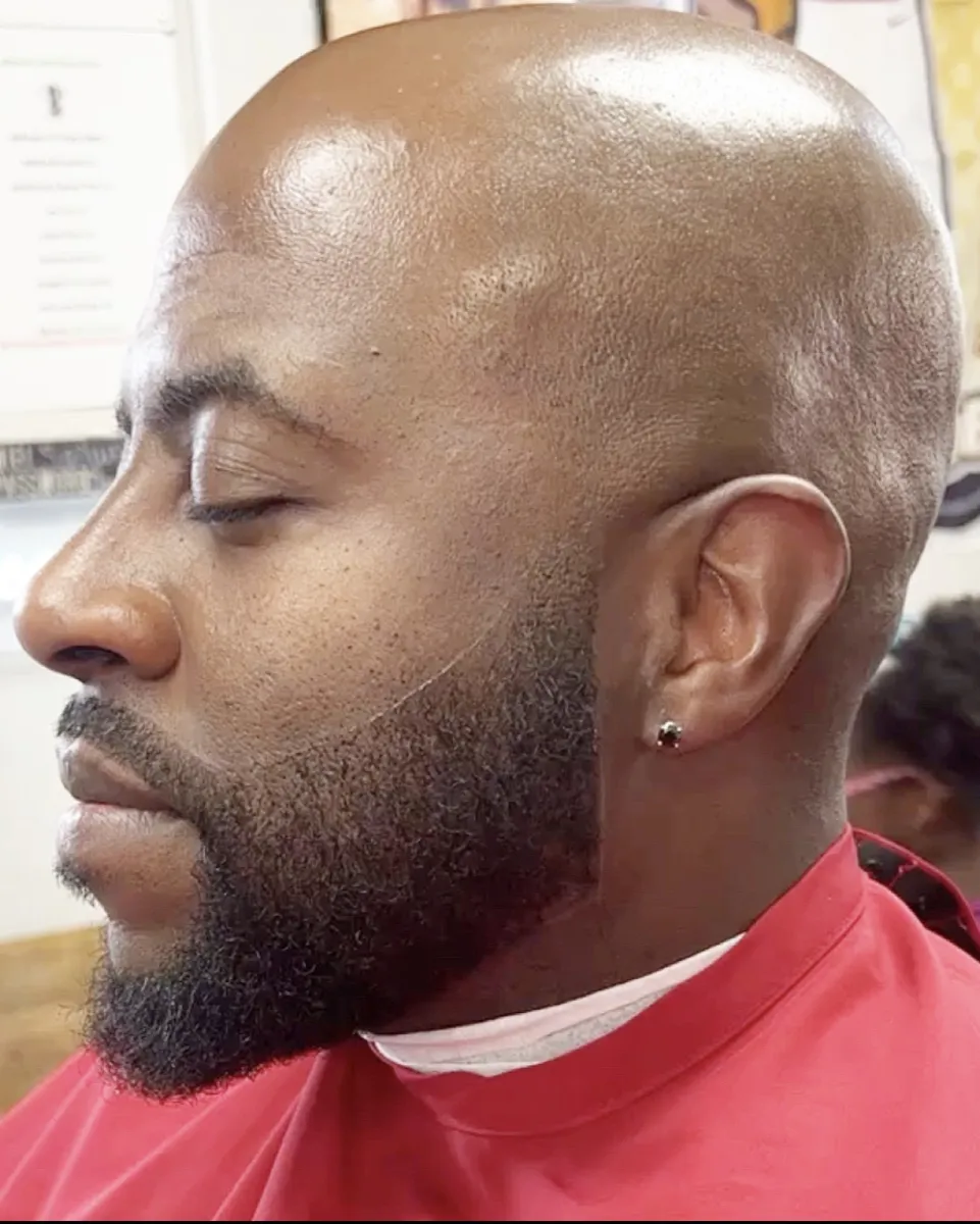 Full beard shaped into a clean, balanced profile by Monte Kuts.