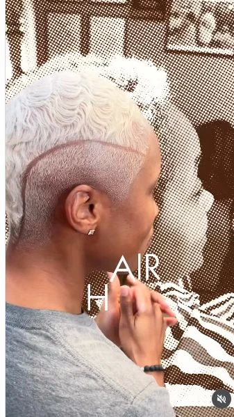 Platinum crop with a clean fade and line detail.