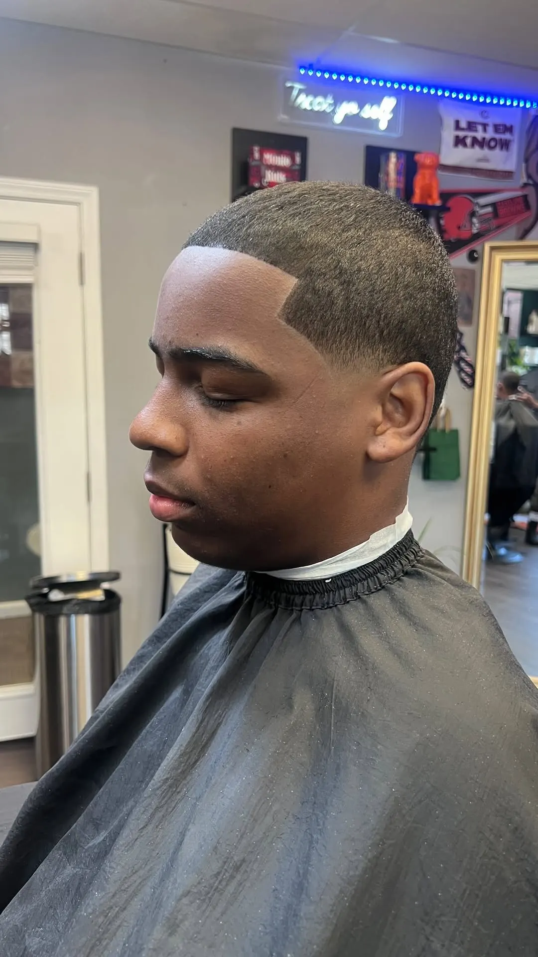 A low taper finished with a razor-sharp line-up, cut by Monte Kuts.